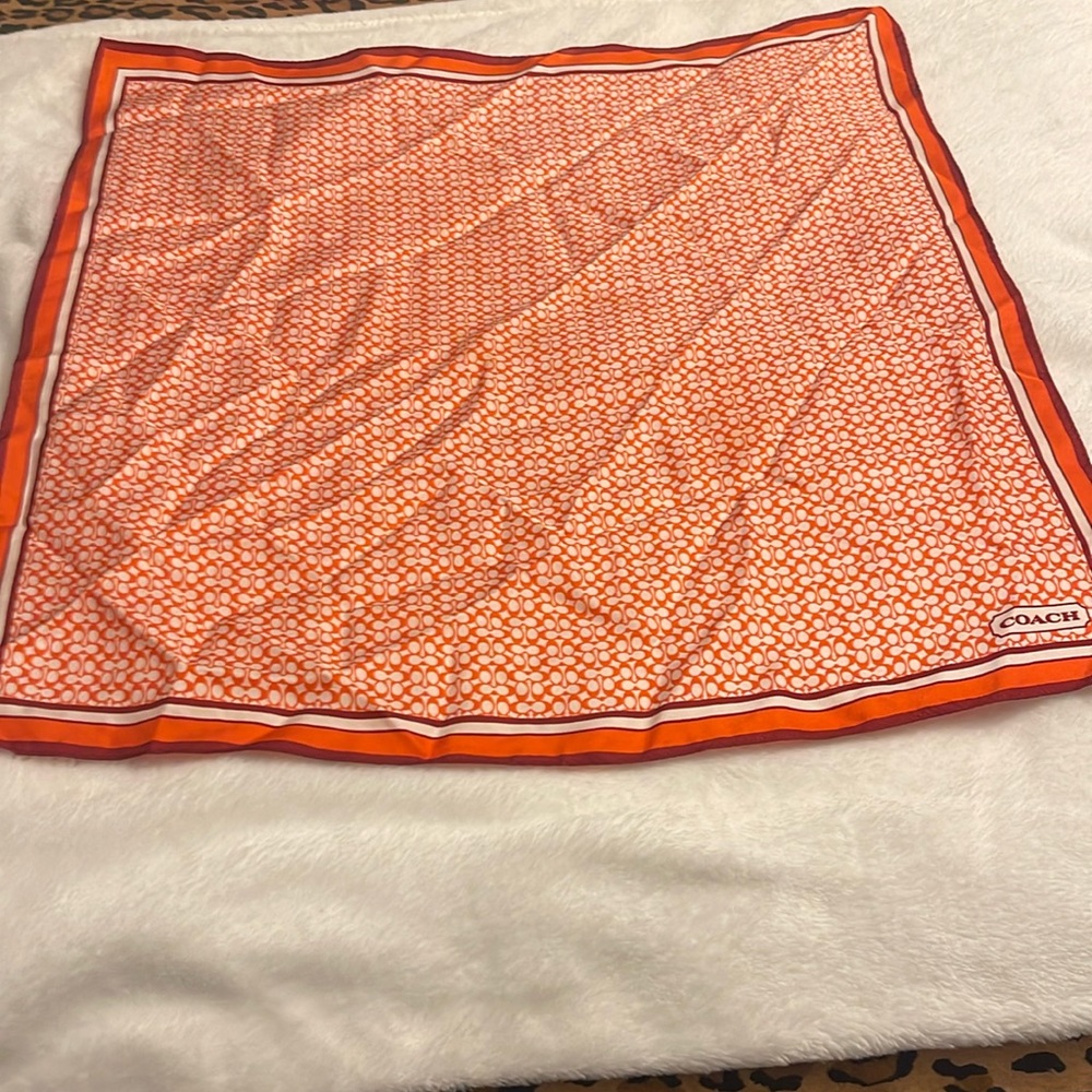 Coach signature print scarf in orange and white